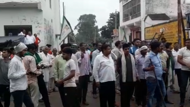 workers lodged a protest by showing black flags to the BJP convoy