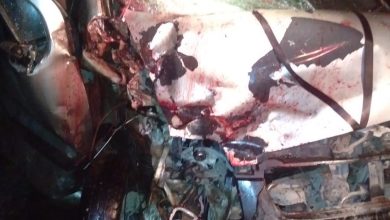 Traumatic death of a person riding a bike in a collision between a car and a bullet